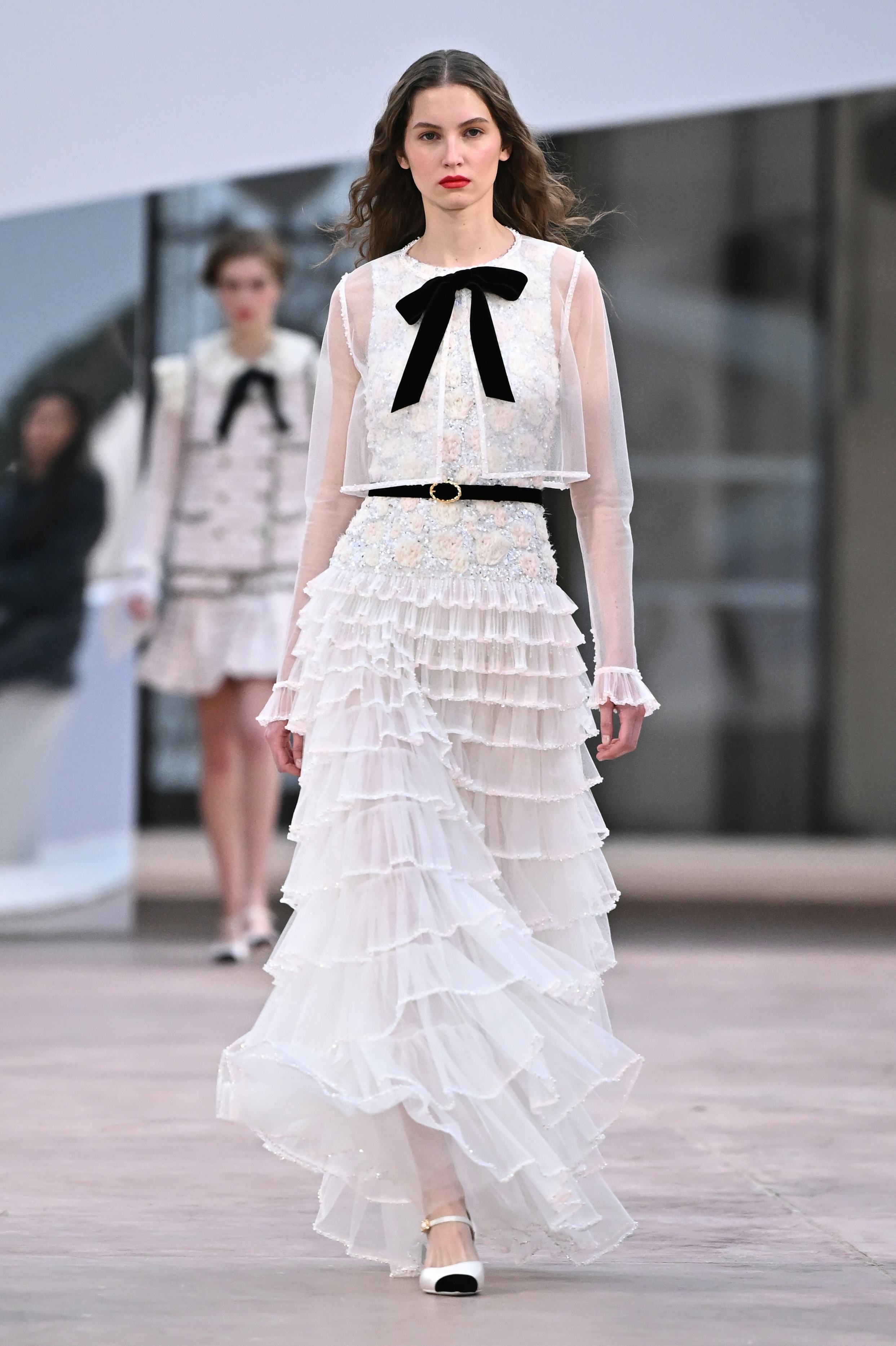 A Chanel model walking the runway for their Spring 2025 couture show