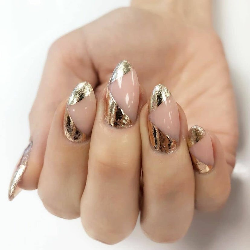 Gold foil nails are on trend for Valentine’s Day 2025.