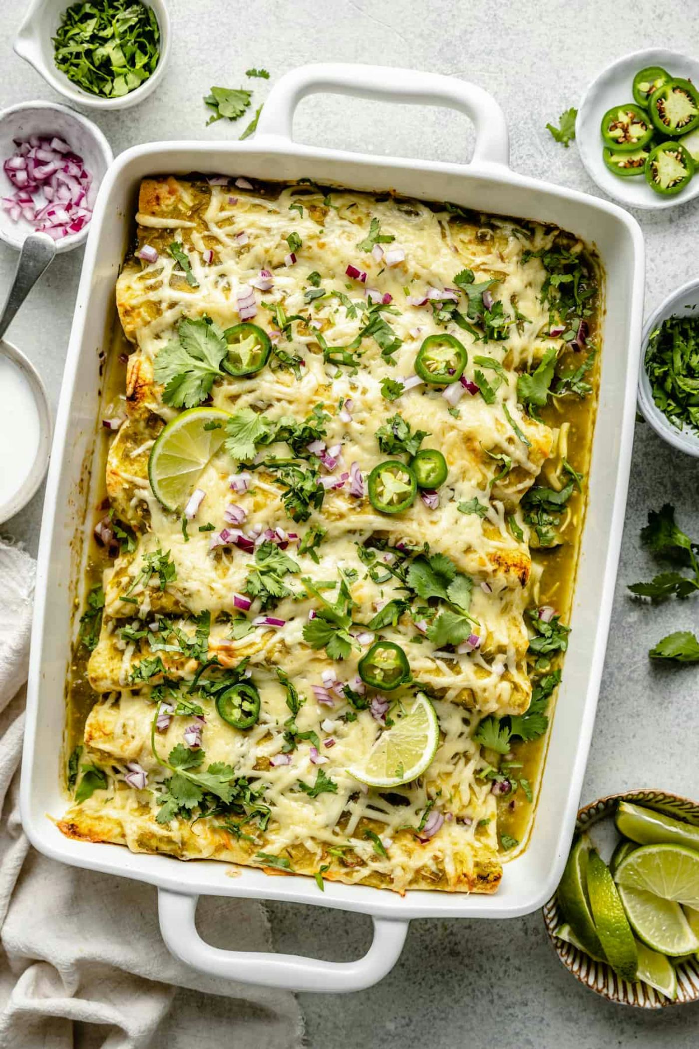 Green chicken enchiladas, an easy rotisserie chicken recipe or leftover chicken recipe.