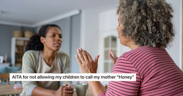 Two women sit at a table engaged in a serious conversation. One woman is speaking passionately, whil...