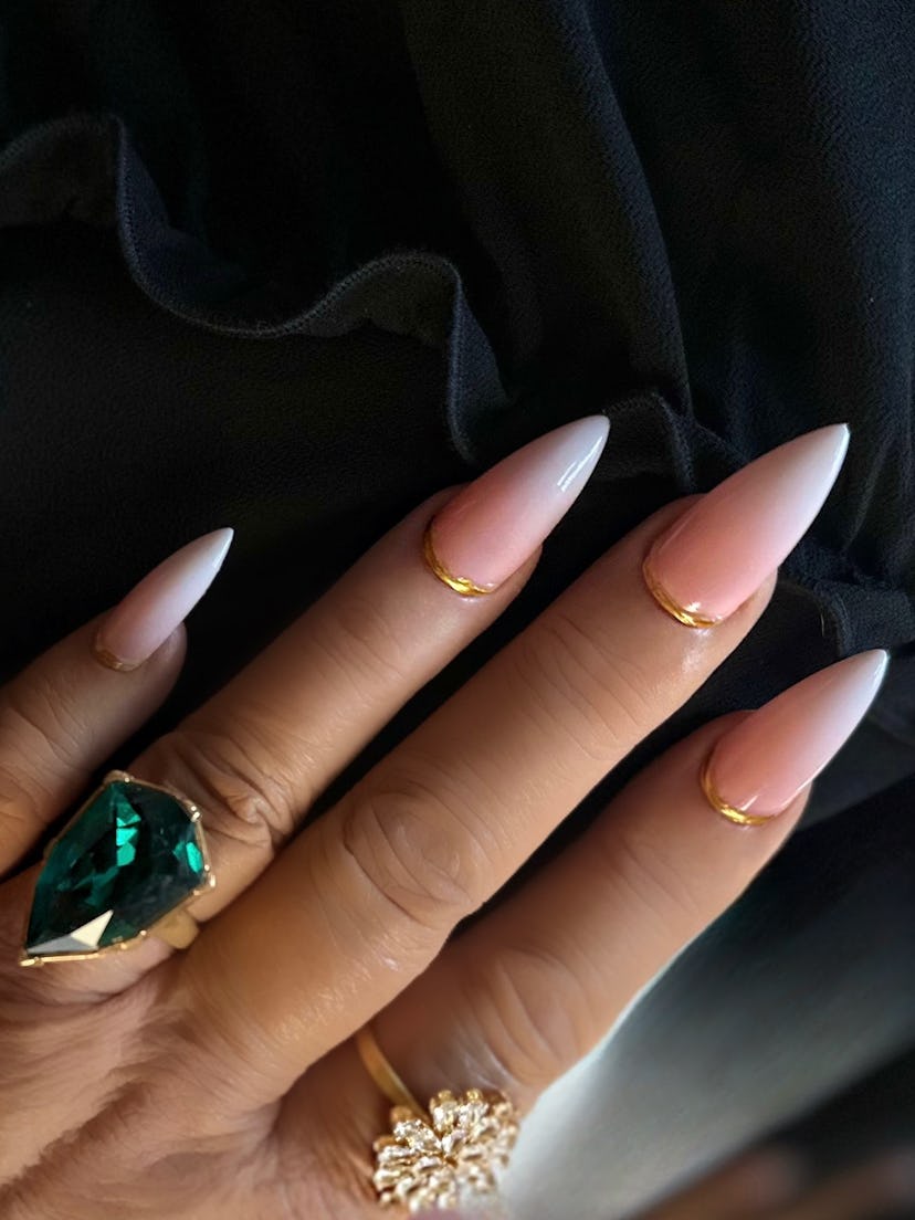 Jennifer Coolidge wore ombré French nails with gold nail cuffs to the 2025 Golden Globes.