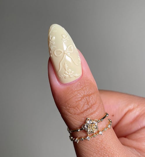 Scroll through mod nail art ideas that match the buzzy 1960s aesthetic.