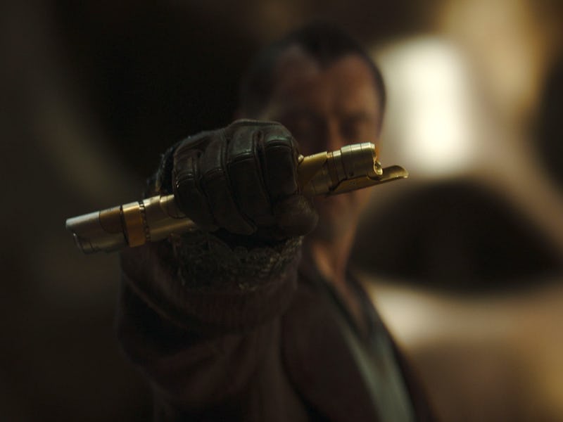 Jod (Jude Law) with this found lightsaber in 'Skeleton Crew.'