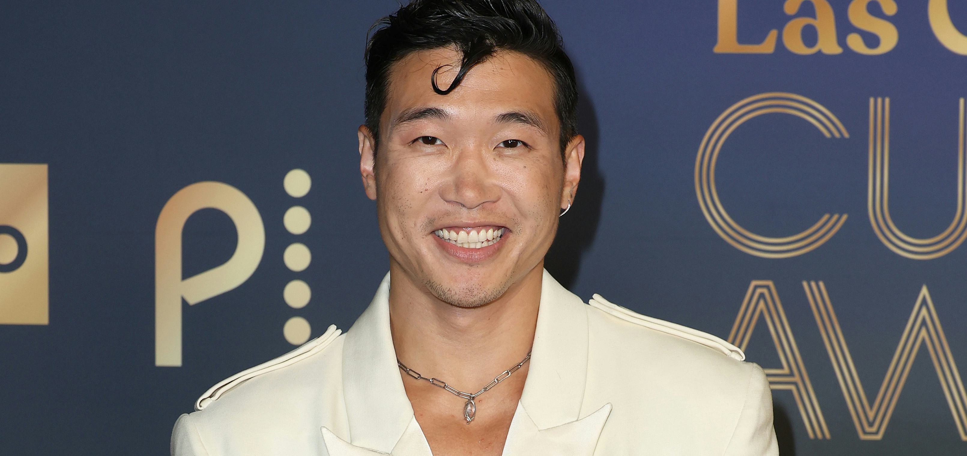 Exclusive: Joel Kim Booster Regrets Turning Down This Reality TV Show