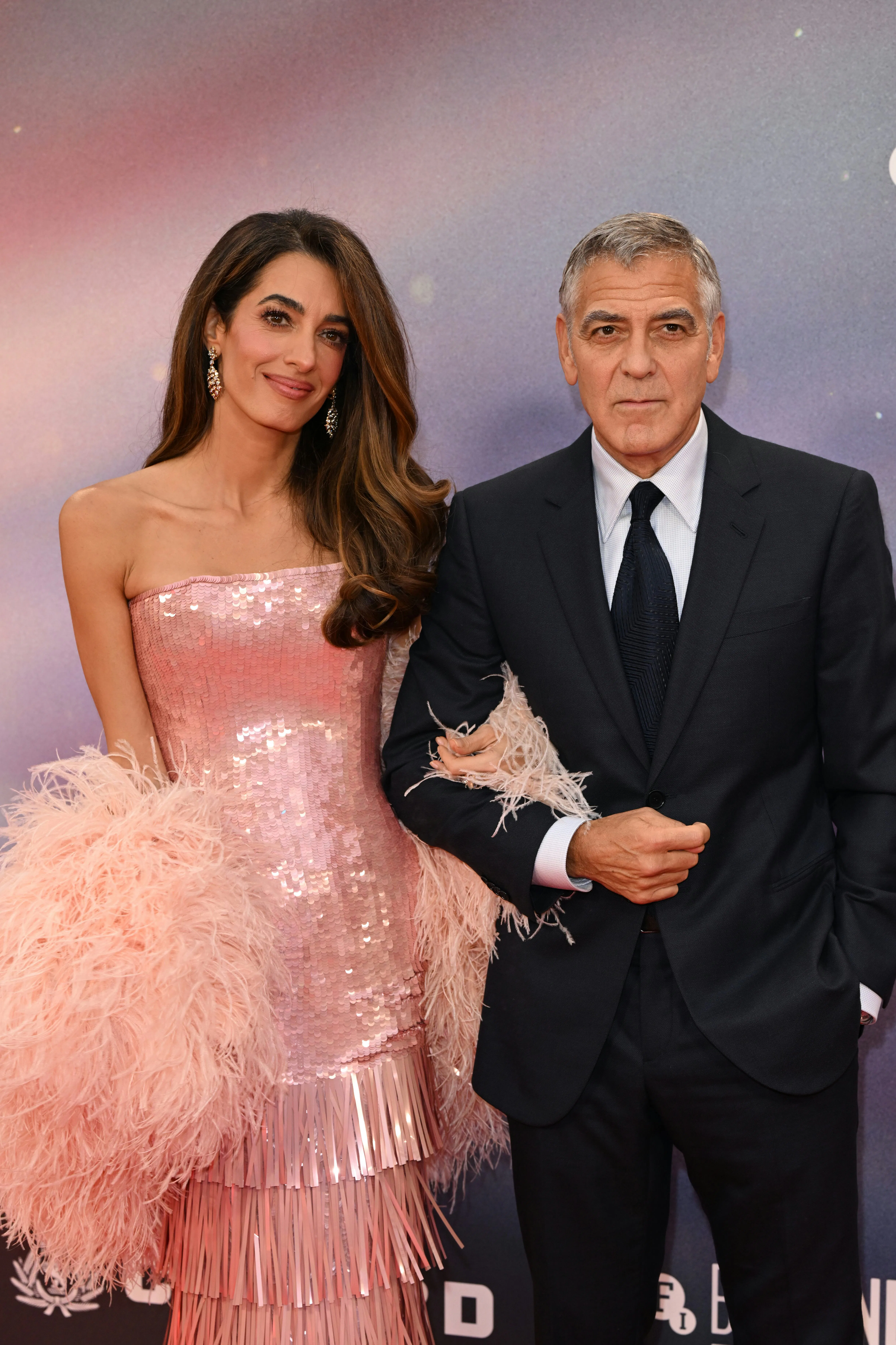 Amal Clooney Stuns in Sequin Fringe Dress With Feather Cape at George's  Premiere