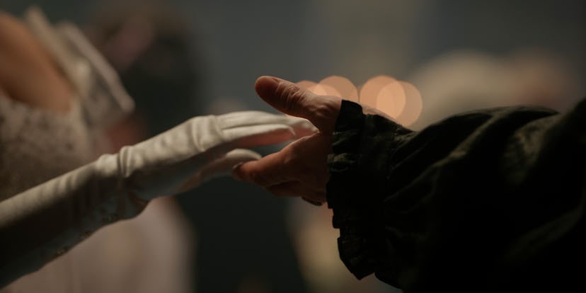 Benedict and Sophie's hands in Bridgerton Season 4. Photo via Netflix