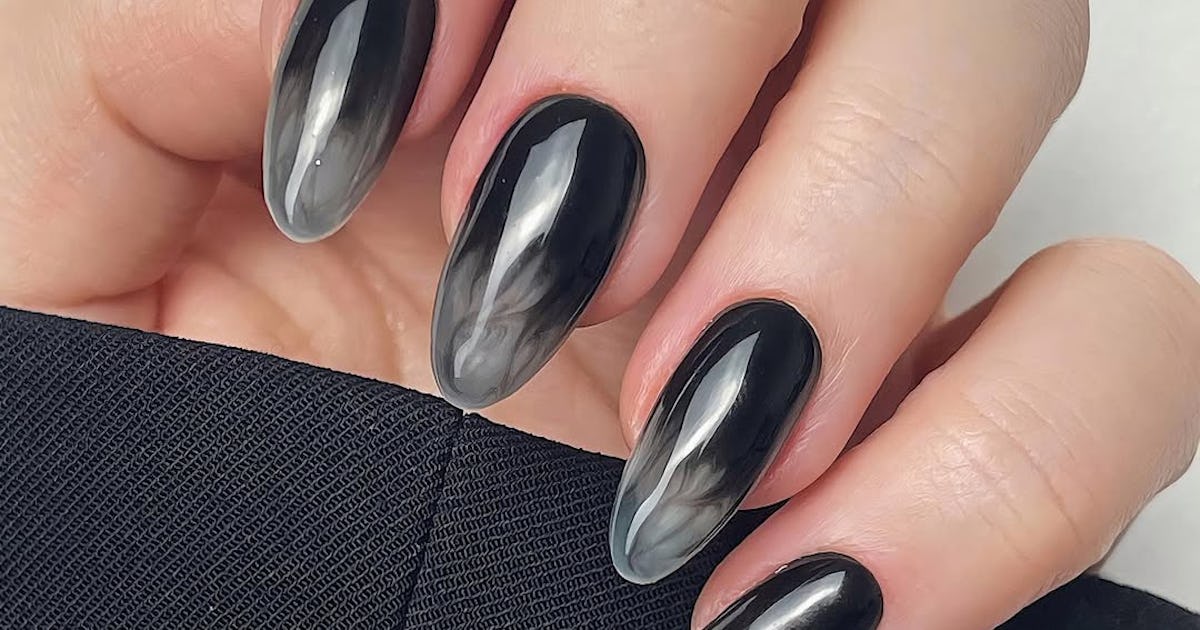TikTok's "Smoke Nail" Trend Brings Witchy, 'Practical Magic' Energy To Your Mani