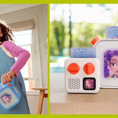 A girl sings along to her Yoto player.