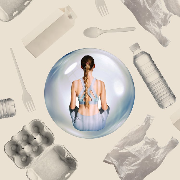 A woman sits inside a bubble. Outside are common plastic items, like disposable water bottles and fo...