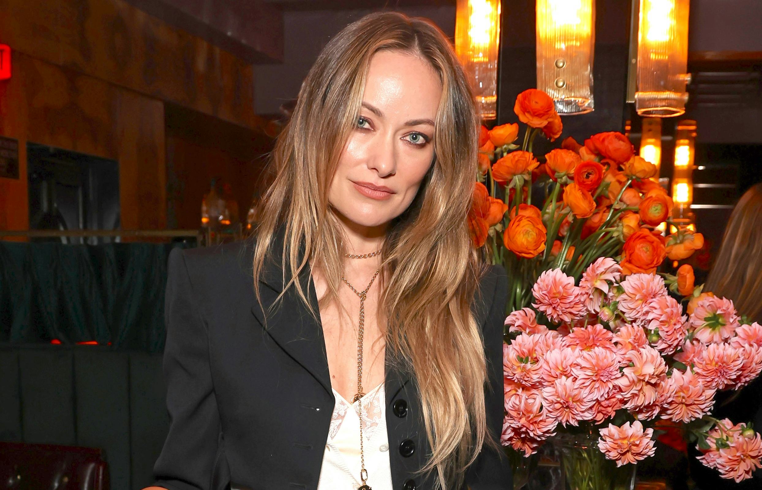 Olivia Wilde Paired A Sexy See-Through Lace Top With A Y2K-Era It Bag