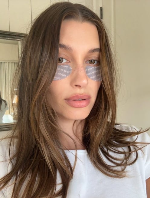 Hailey Bieber wearing Rhode's Eye Peptide Prep under eye patches