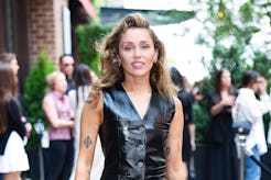 Miley Cyrus' curly blonde pixie on the cover of 'Vogue France' is so '80s pop star-coded.