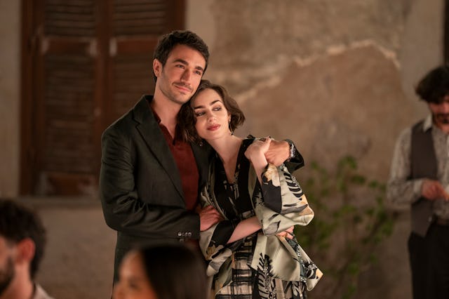 Emily in Paris. (L to R) Eugenio Franceschini as Marcello, Lily Collins as Emily in 'Emily in Paris....