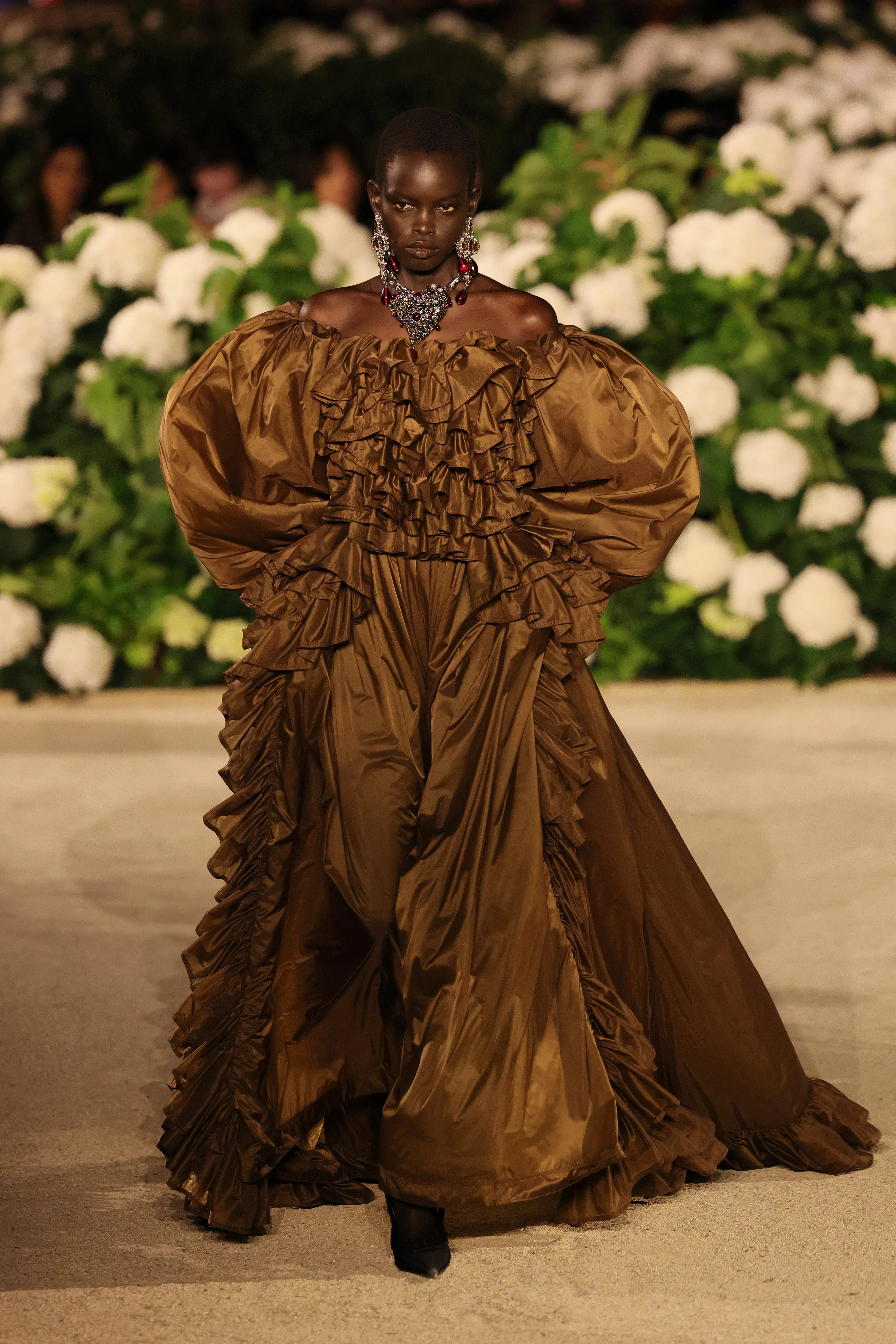https://imgix.bustle.com/uploads/image/2025/10/7/d94571ff/gettyimages-2238160477.jpg?crop=faces&dpr=2&fit=crop&h=585&w=390