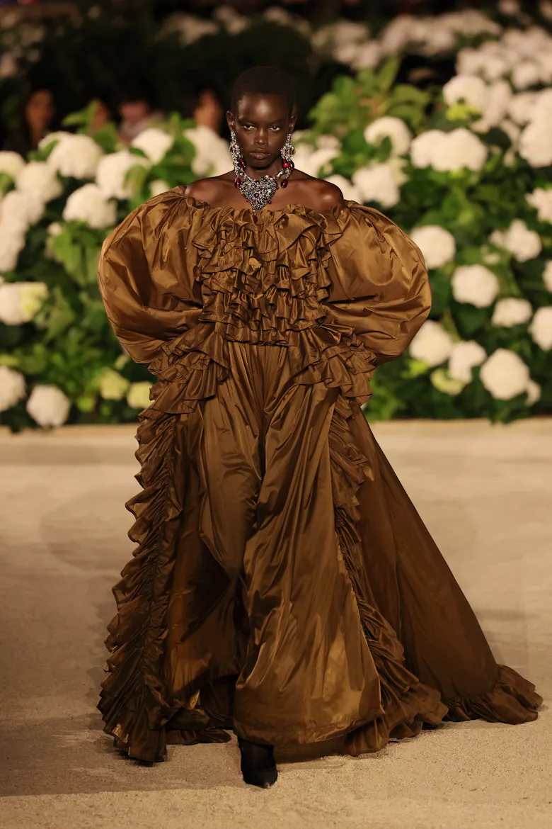 https://imgix.bustle.com/uploads/image/2025/10/7/d94571ff/gettyimages-2238160477.jpg?crop=faces&dpr=2&fit=crop&h=585&w=390