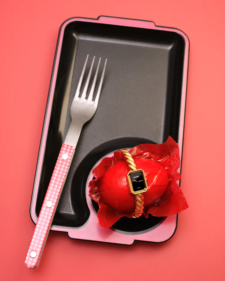 Chanel watch on a lunch tray