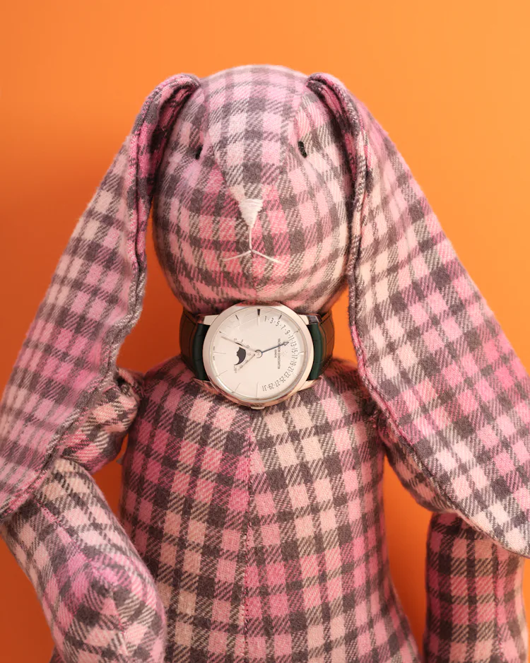 Vacheron Constantin watch on a plaid stuffed rabbit