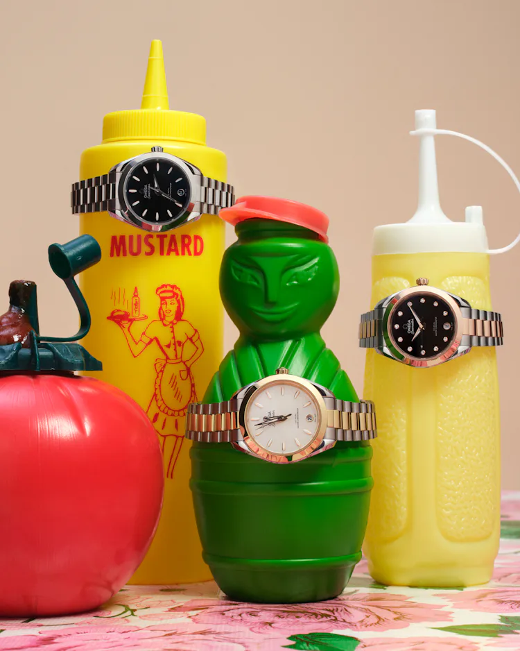 Omega watches on various squeeze bottles
