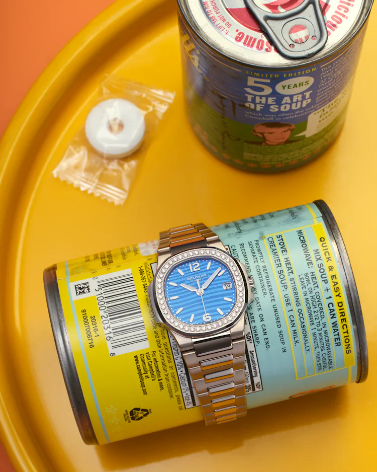 Patek Phillipe watch on a can