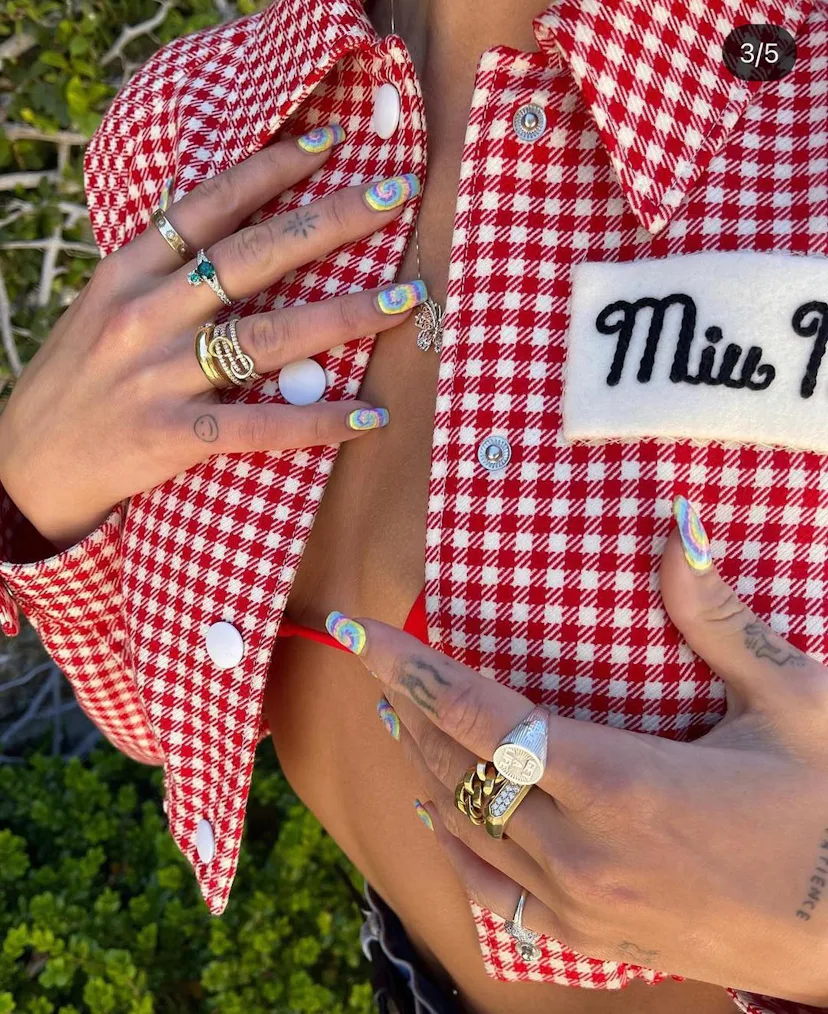 Dua Lipa with tie-dye nails