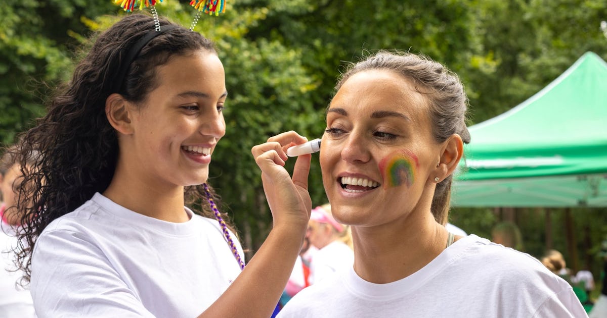 What To Say (& Not Say) When Your Kid Comes Out, According To Experts