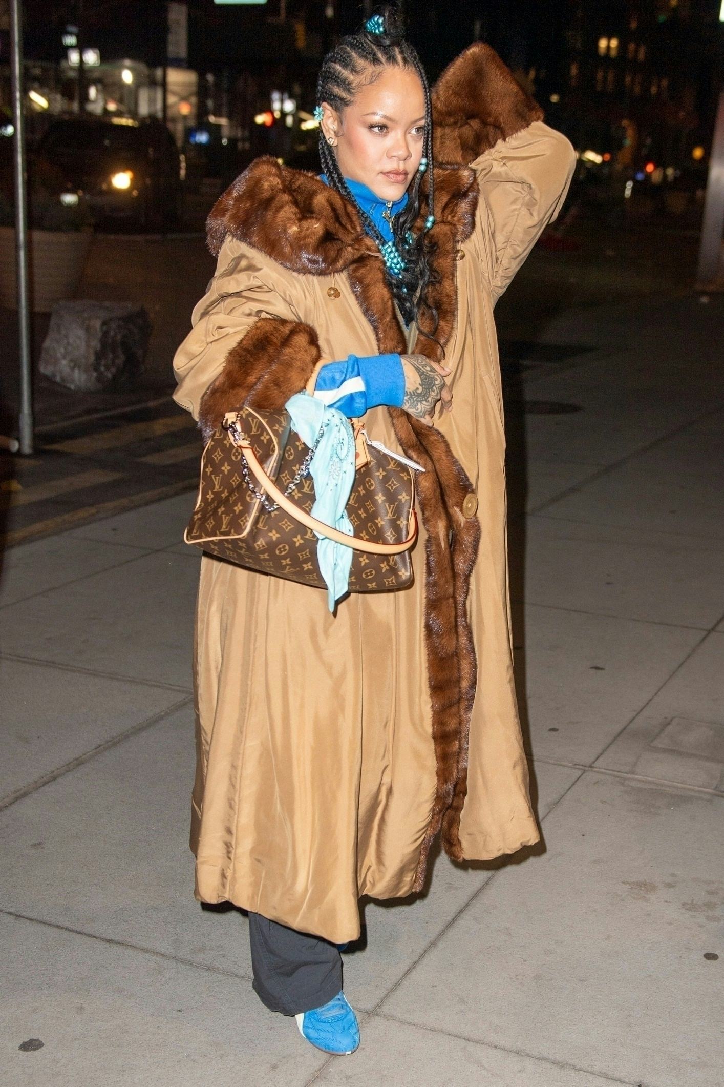 Rihanna holding a Louis Vuitton bag