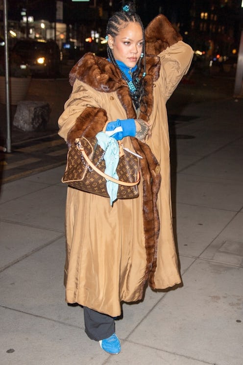 Rihanna holding a Louis Vuitton bag