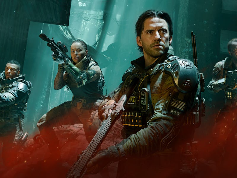 Four armed soldiers in tactical gear stand alert in a dimly lit, industrial setting with red smoke a...