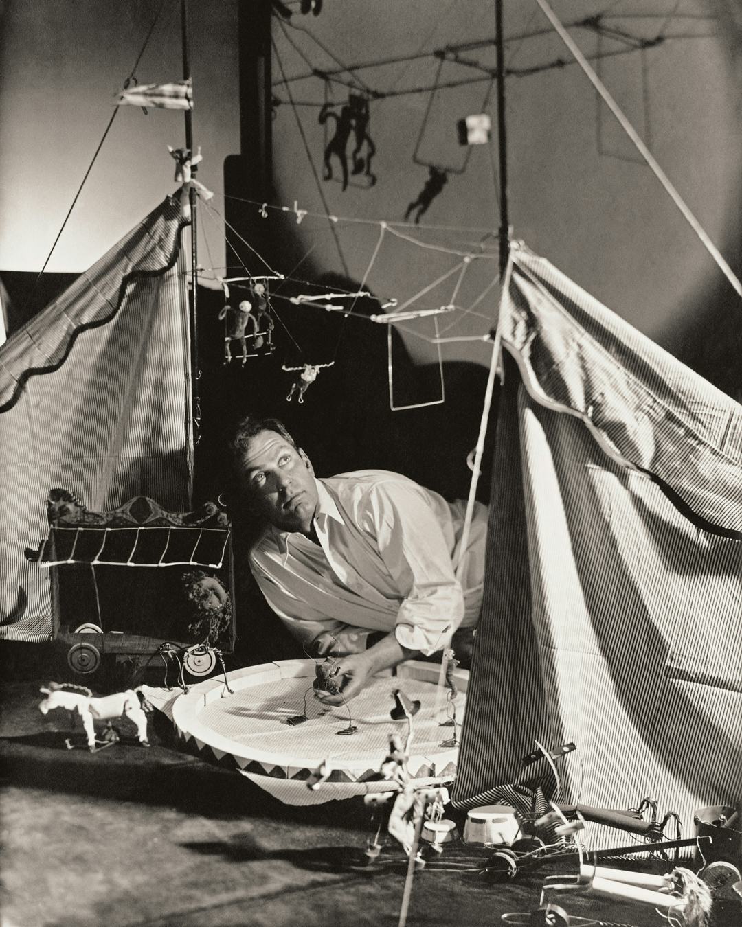 Alexander Calder, in Paris in 1930, with Cirque Calder, 1926–31
