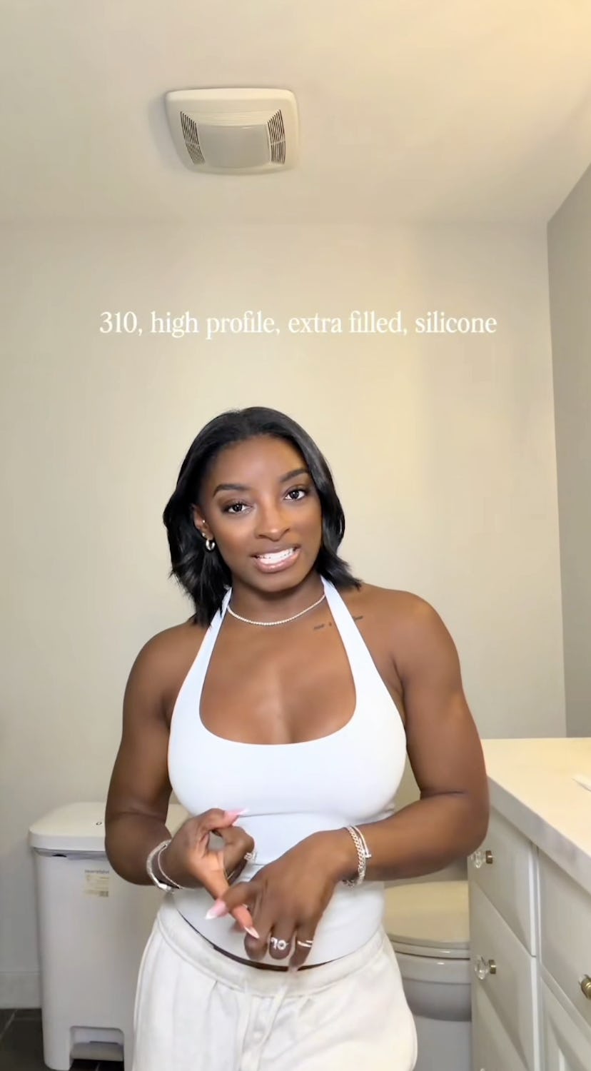 Simone Biles shares breast augmentation details on TikTok. Screenshot via TikTok