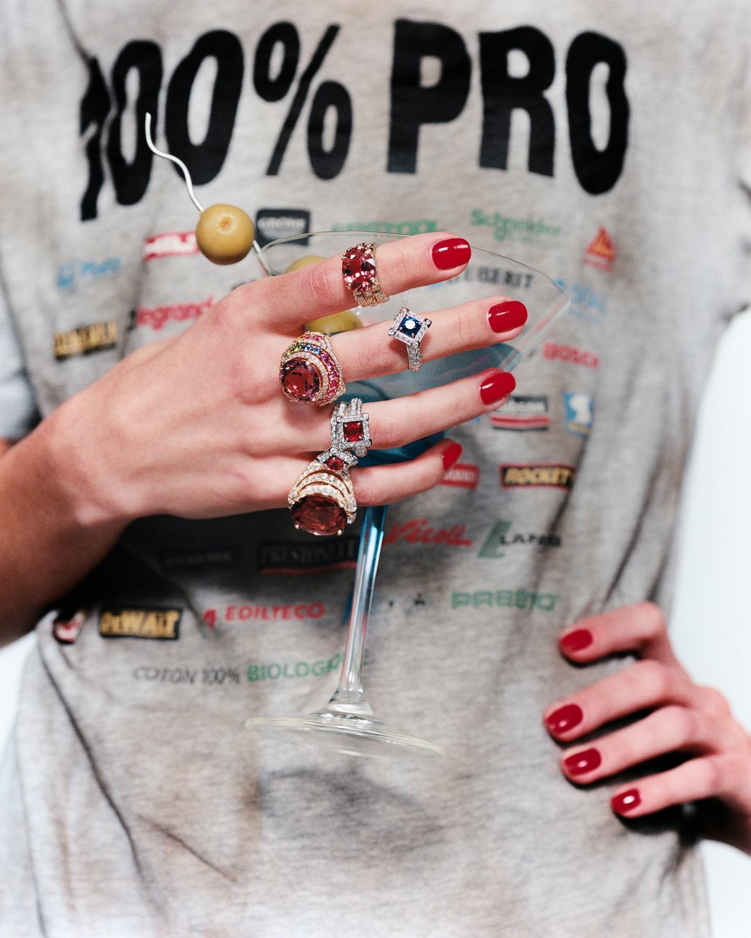 A model with jewelry on her fingers