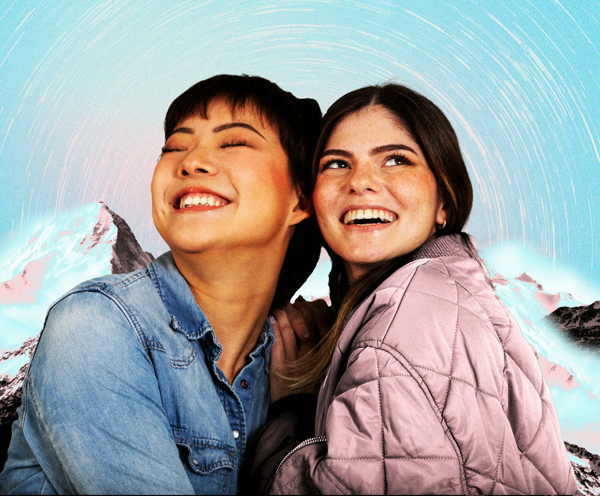 A happy couple in front of the mountains before reading their December 2025 horoscope.