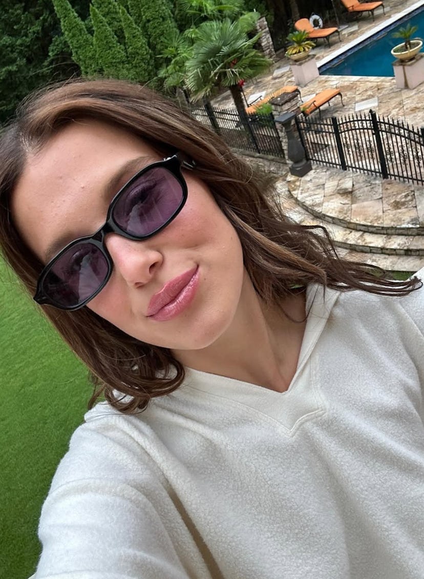 Millie Bobby Brown wore a crop top in an ad for her eyewear collection.