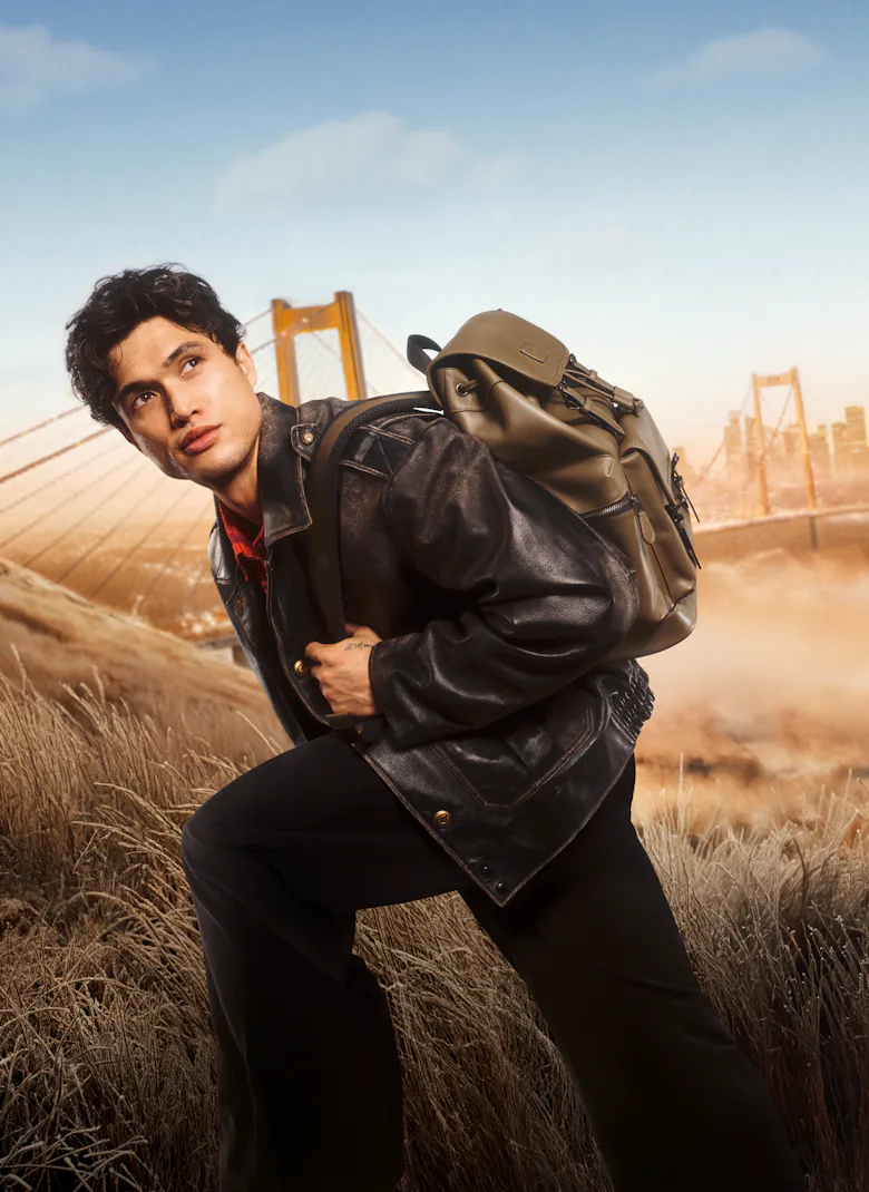 Charles Melton coach holiday campaign