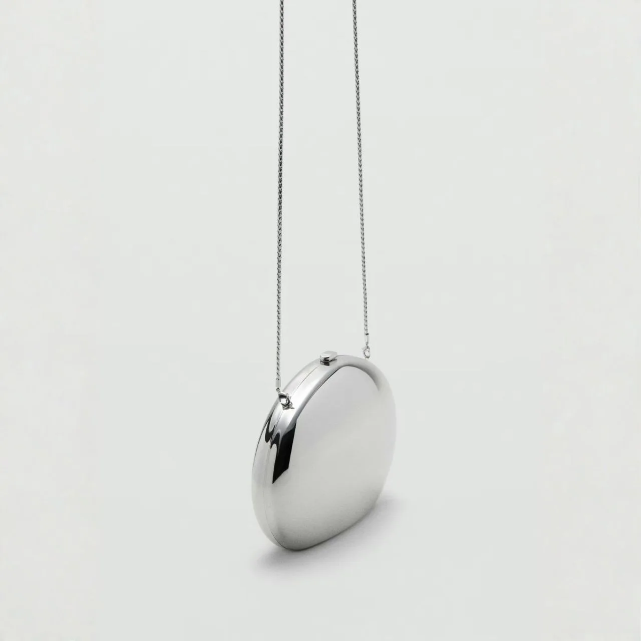 Oval clutch bag