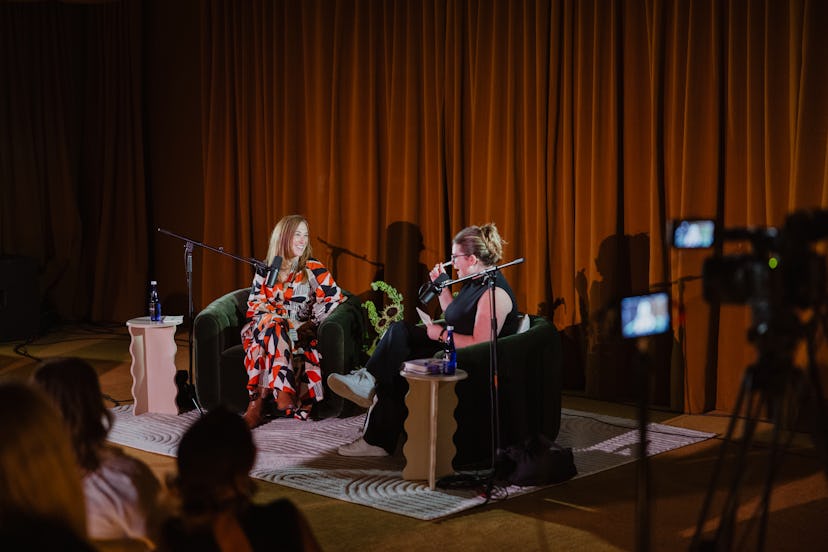 Courtney Alev at a podcast.