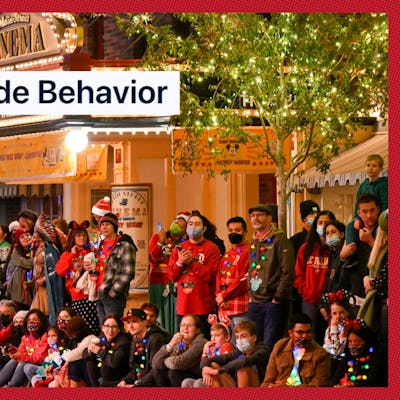 A crowd at a holiday parade at Disney World.