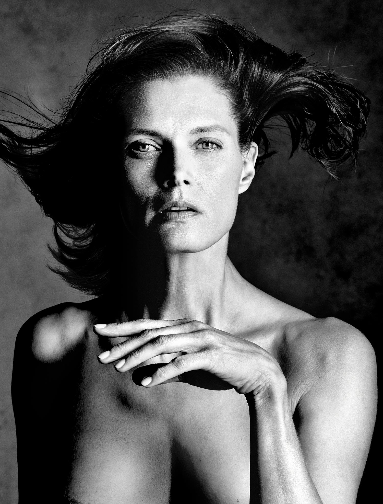 Model Malgosia Bela with windswept hair and fresh skin