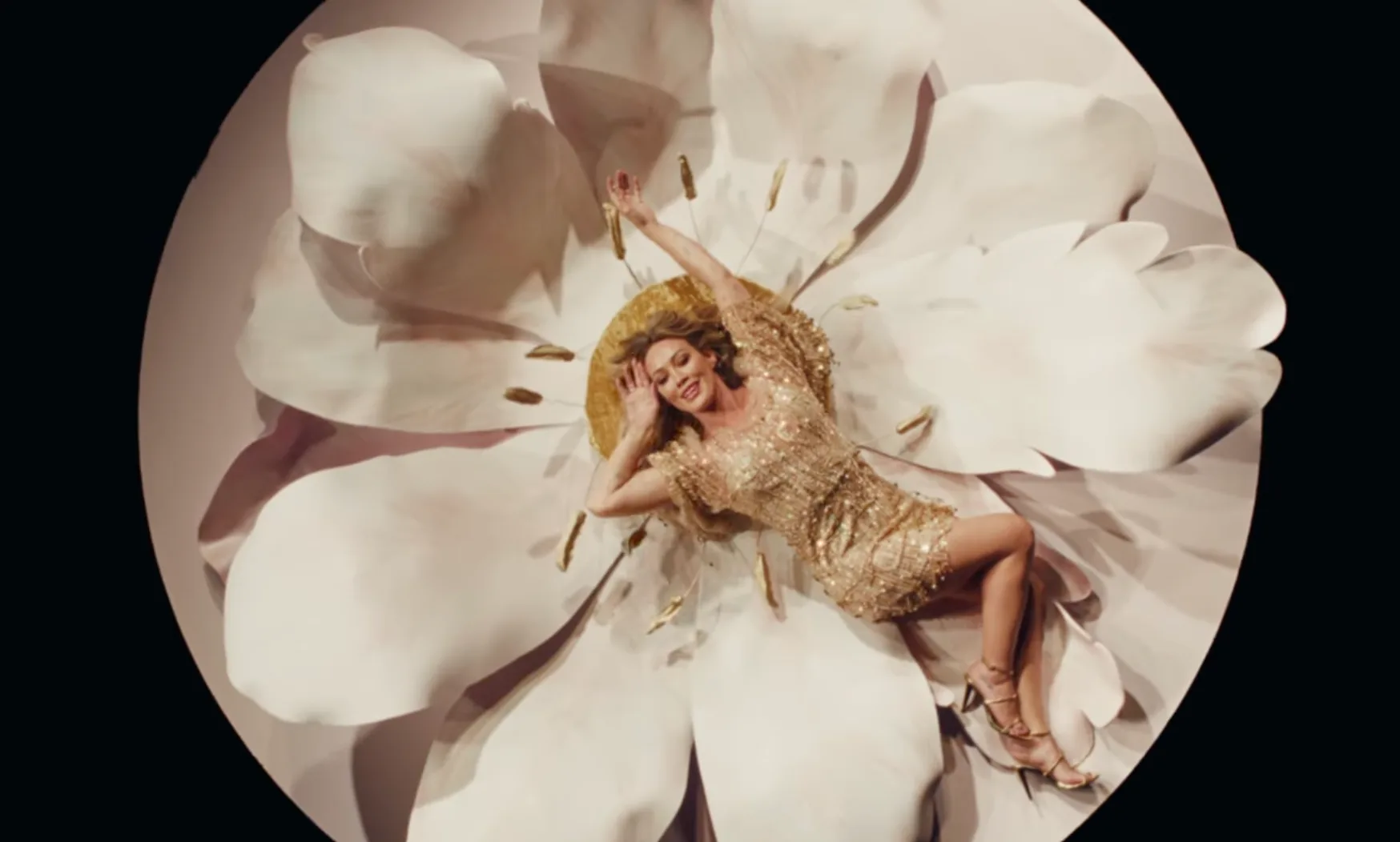 Hilary Duff's gold mini in the "Mature" music video