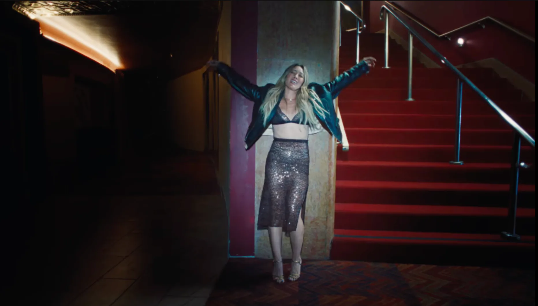 Hilary Duff's lacy brown sequin bra in "Mature" music video