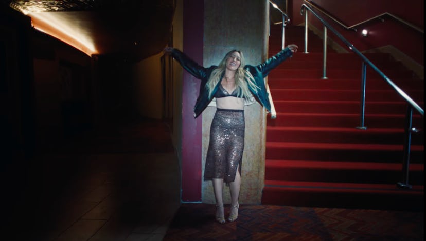 Hilary Duff's lacy brown sequin bra in "Mature" music video