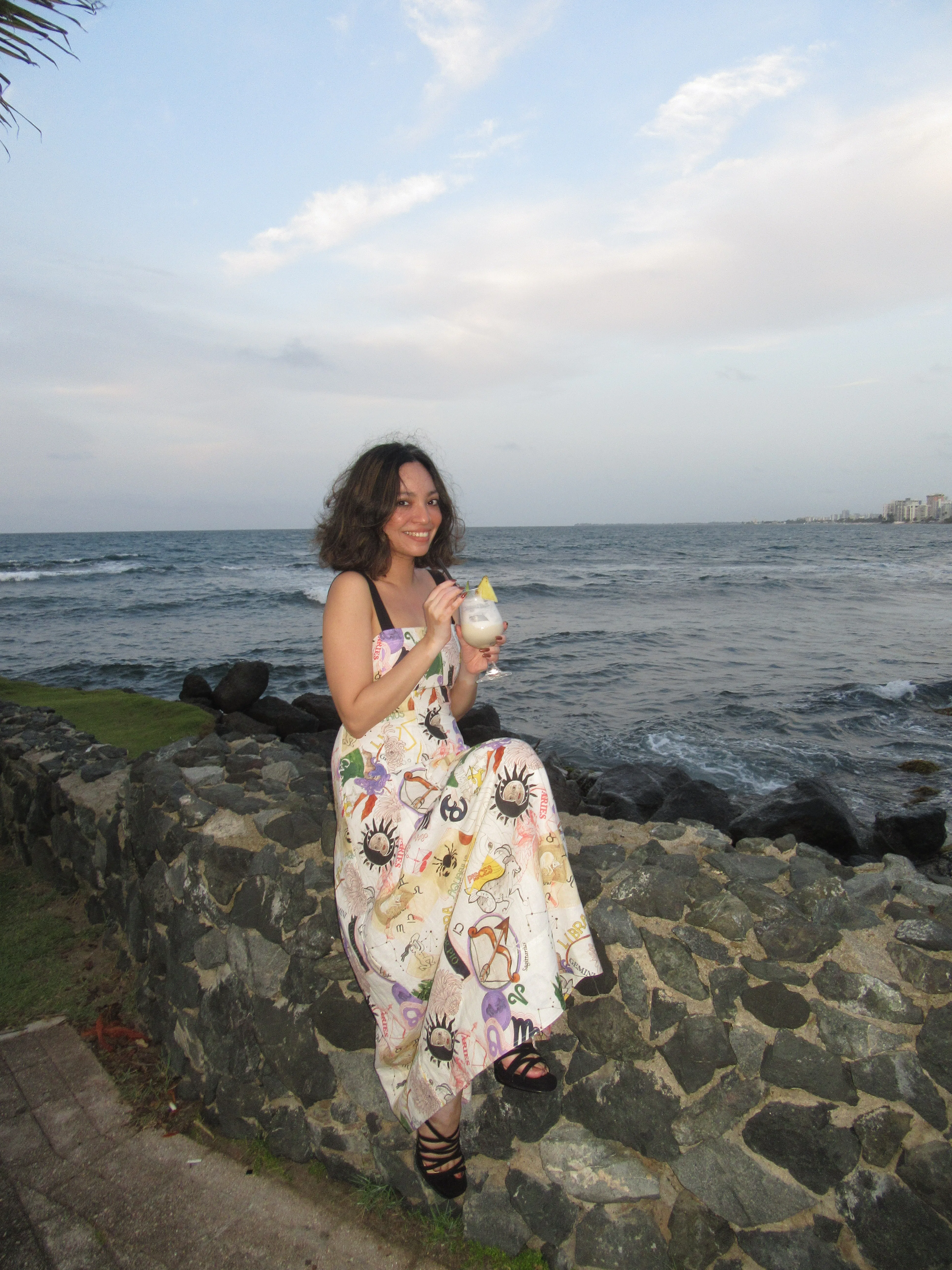 The writer with a piña colada at Caribe Hilton.