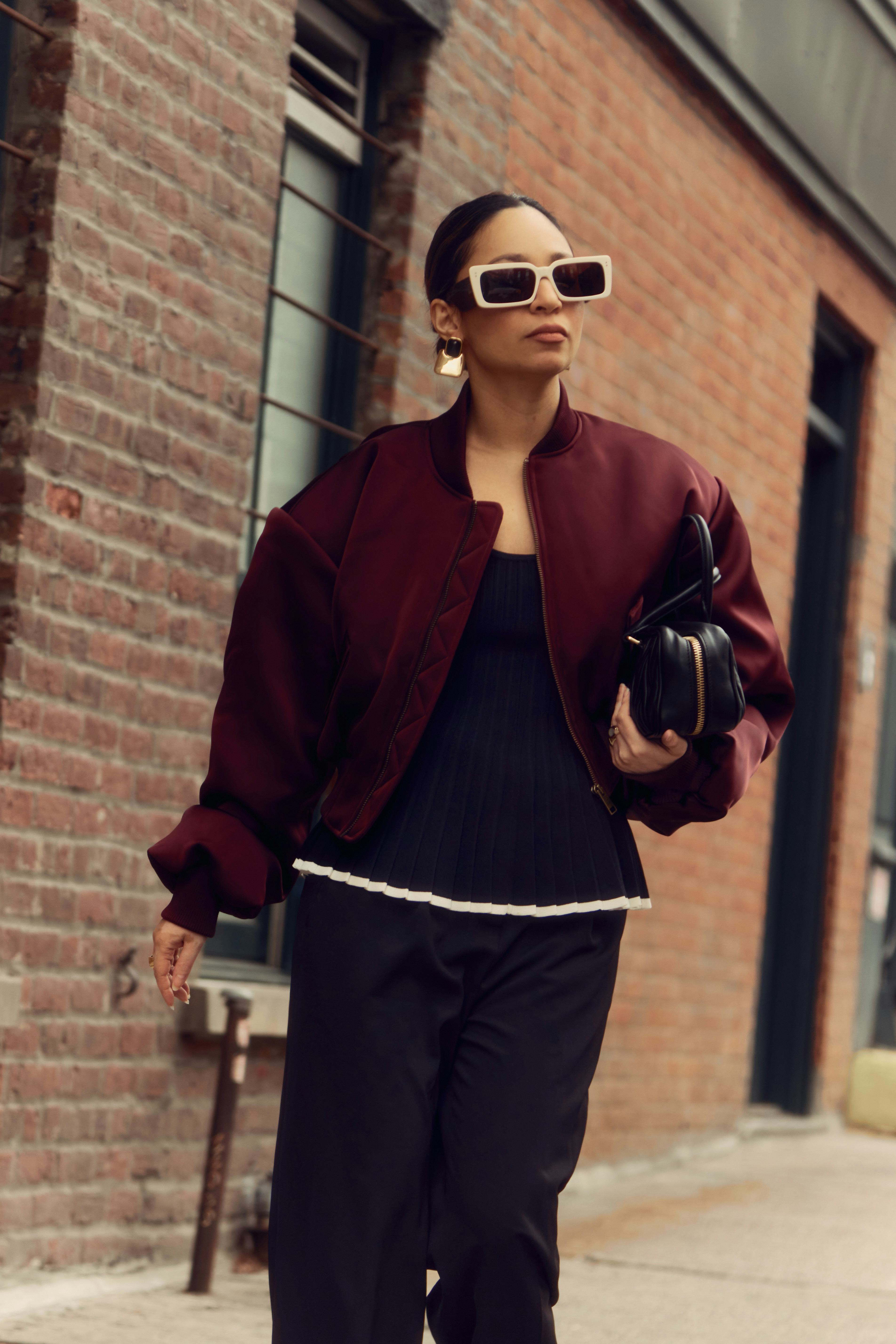 The writer wearing cheugy peplums. 