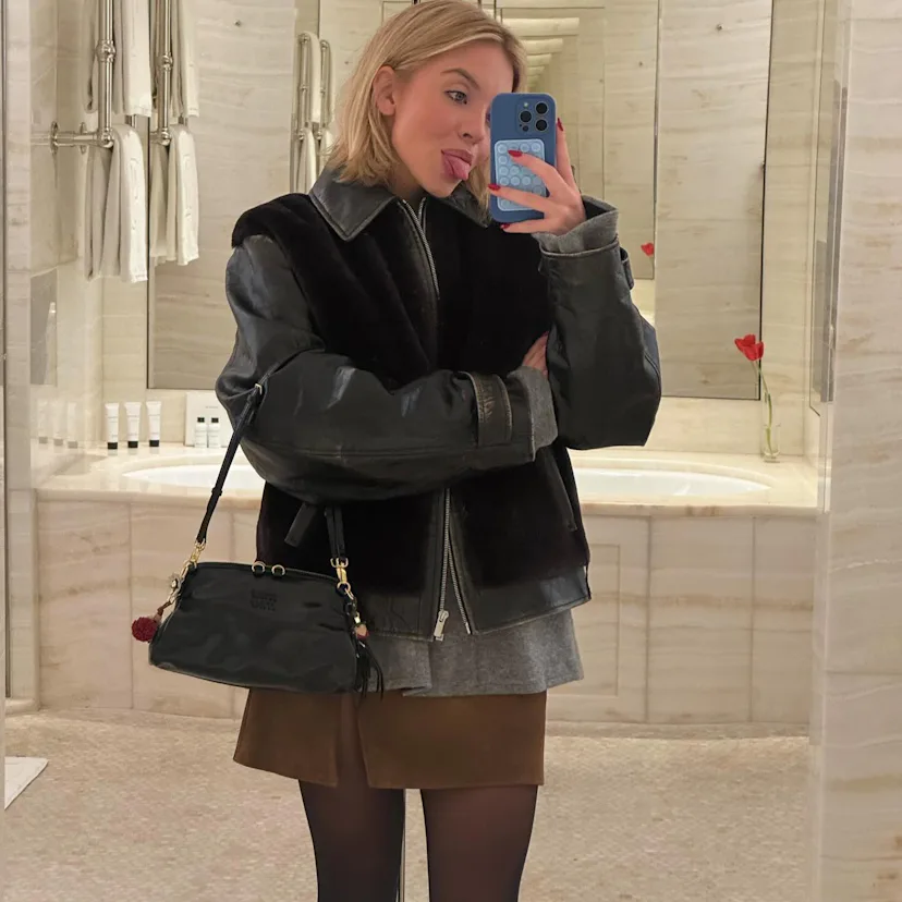 Sydney Sweeney wears a jacket and miniskirt.