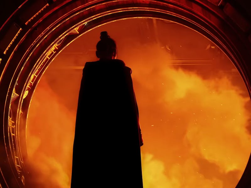 A force user stands in the open doorway of a spacecraft.