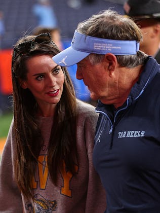 SYRACUSE, NEW YORK - OCTOBER 31: Jordan Hudson speaks with Bill Belichick of the North Carolina Tar ...