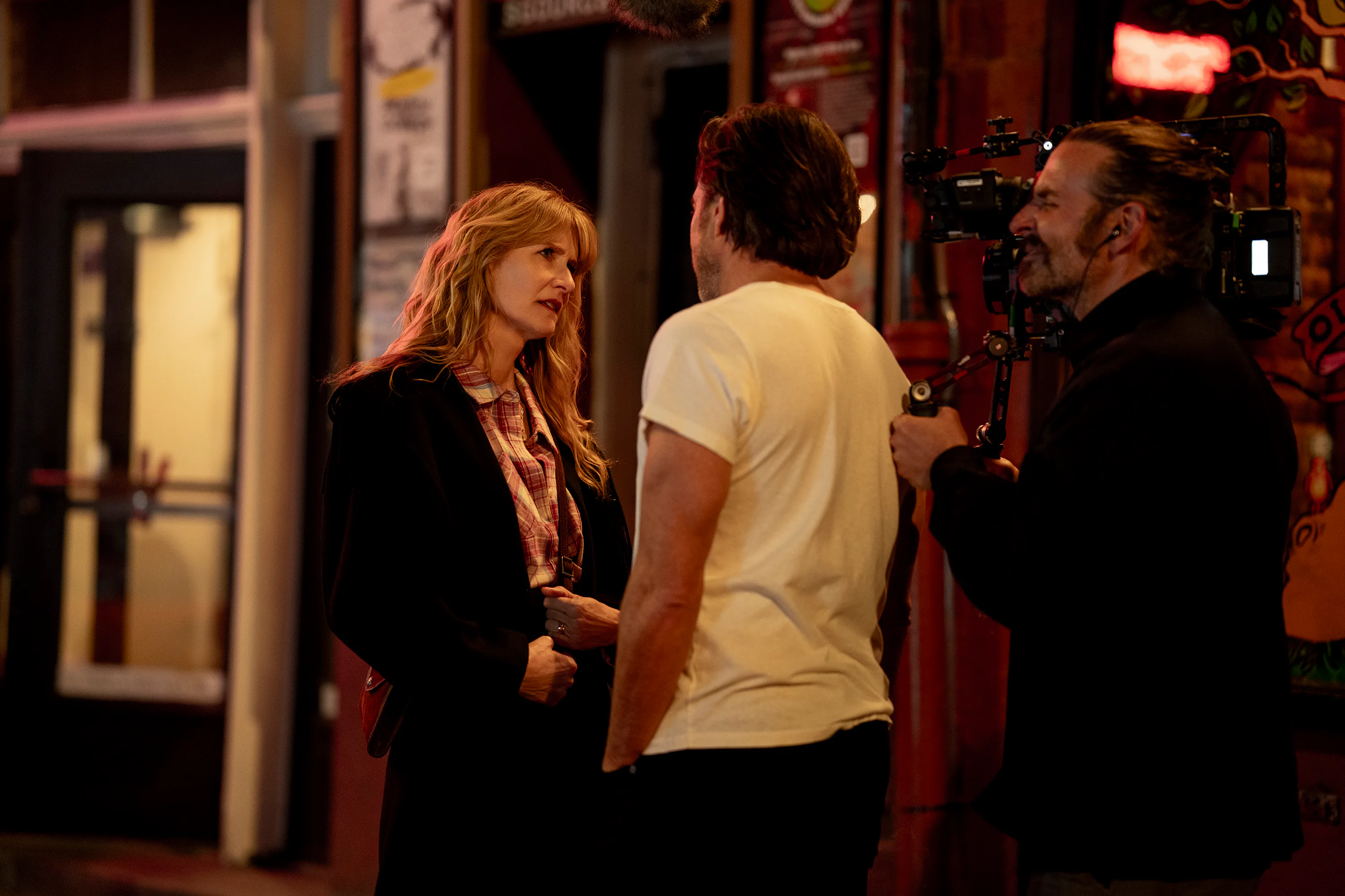 Laura Dern, Will Arnett, and Bradley Cooper making Is This Thing On? Photo via Searchlight Pictures
