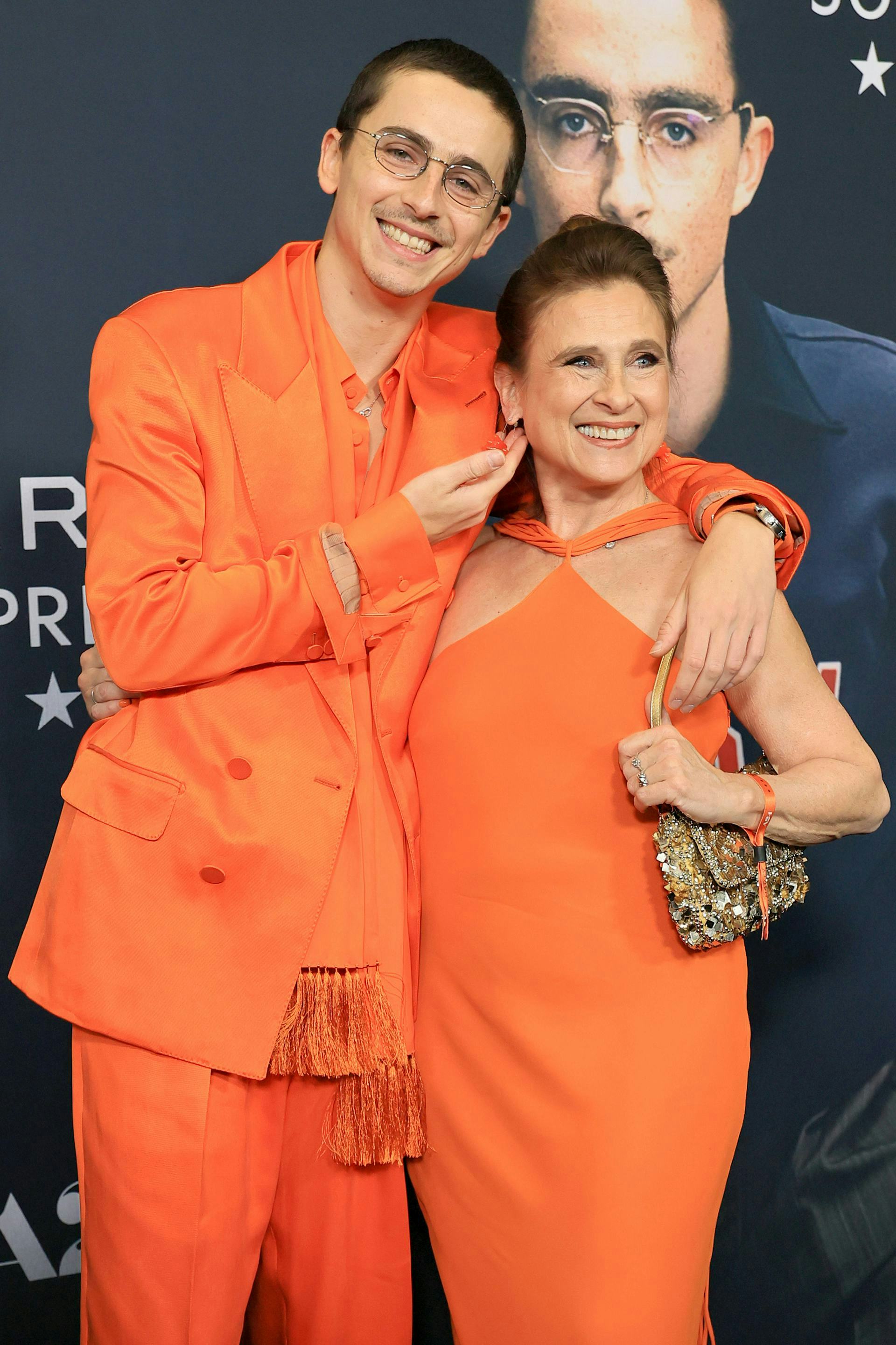 Timothée Chalamet Matches With Mom in 'Marty Supreme' Orange at New York Premiere.