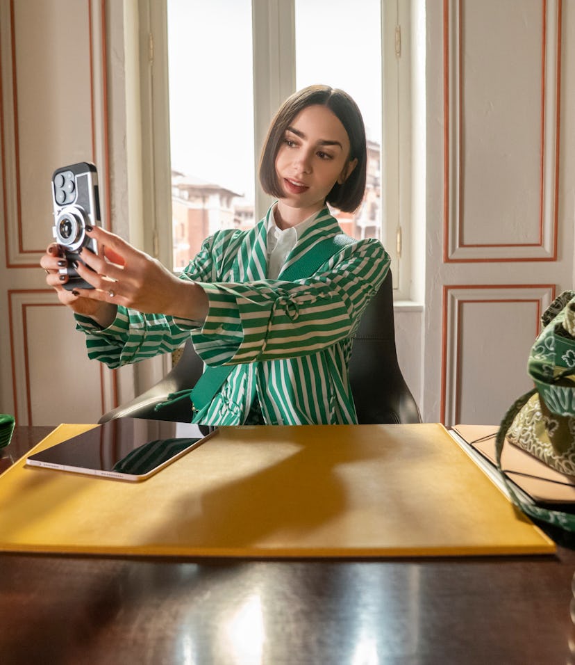 Bryan Greenberg as Jake Campbell, Lily Collins as Emily of Emily in Paris.