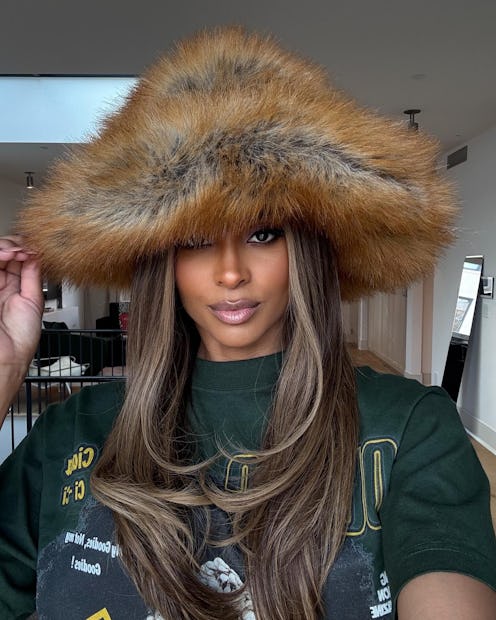 Ciara wearing a fluffy hat with highlighted hair